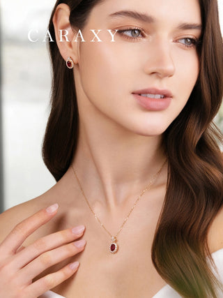 Model wearing July birthstone ruby necklace and matching ruby diamond earrings.