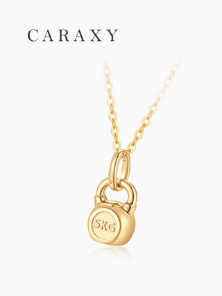 Back view of a gold kettlebell pendant necklace with 5KG detail and polished finish.