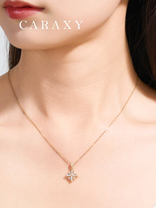 Model wearing a lab grown diamond clover necklace in 18K yellow gold with marquise diamonds, styled for elegant everyday wear.