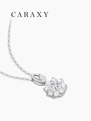 Lab grown diamond flower pendant necklace in 18K white gold, angled view with floral halo design.