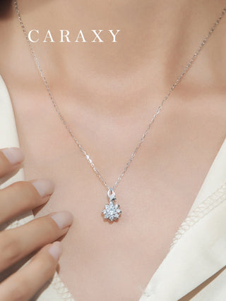 Model wearing floral lab grown diamond necklace caraxy.