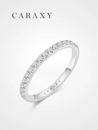 Lab grown diamond half eternity wedding band in an angled view