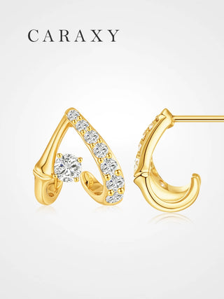 Lab grown diamond open huggie earrings in 18K yellow gold shown from front and back views.