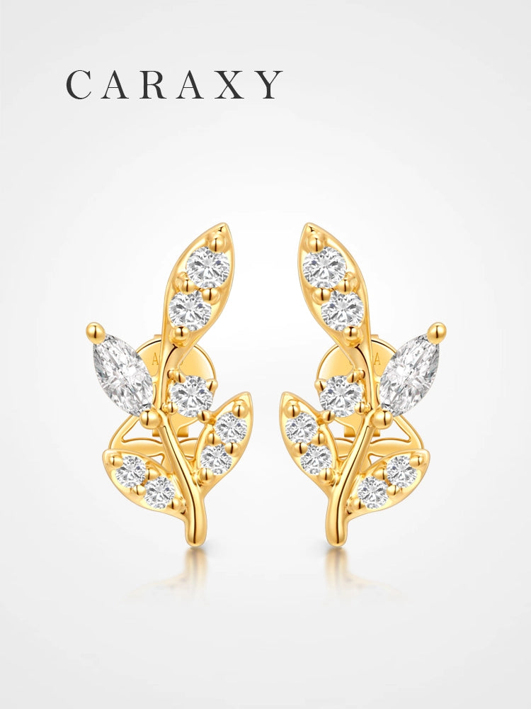 Leaf-inspired lab grown diamond stud earrings in 18K yellow gold with marquise and round diamonds.