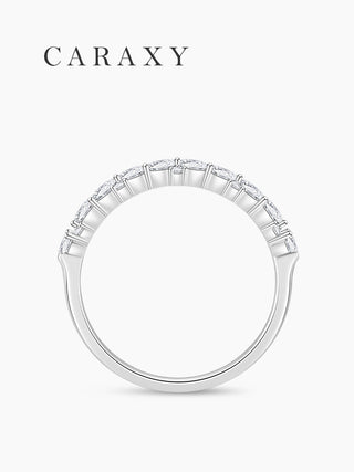Side profile of a leaf-inspired wedding band in 18K white gold