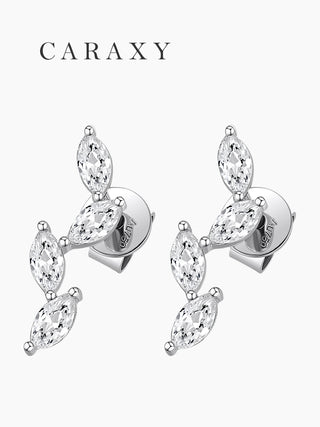 Angled view of leaf vine diamond stud earrings with marquise-shaped stones.