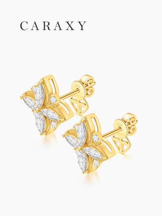 Angled view of marquise diamond floral studs with polished yellow gold details.