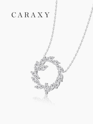 Marquise diamond leaf wreath necklace in 18K white gold, angled view.