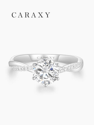 Top view of classic six-prong ring with half pavé twisted band.