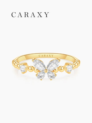 Front view of a butterfly ring featuring pear, marquise, and round lab-grown diamonds