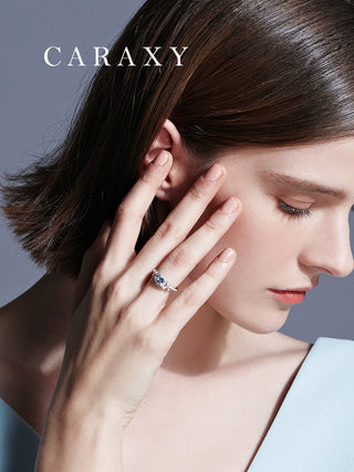 Fashion photography of a model wearing the blue diamond butterfly ring, showcasing its elegant scale on the hand.