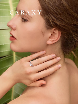 model wearing symbolic butterfly diamond ring outdoor close-up