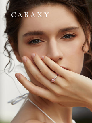 Model wearing princess cut side stone engagement ring lifestyle.