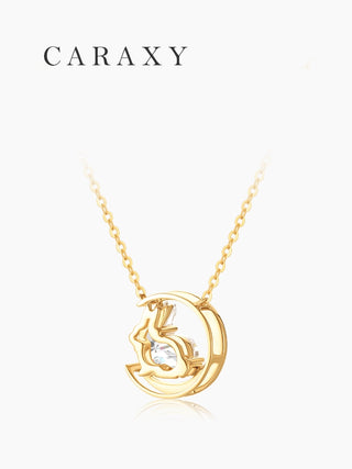 Back view of moon rabbit crescent necklace showing open gallery design in 18K yellow gold.