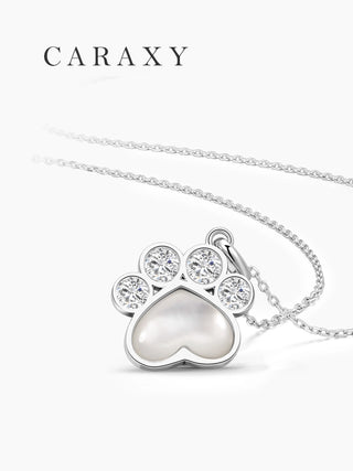 necklace-close-up.jpg
Close up of paw inspired mother of pearl pendant necklace with bezel set lab grown diamonds in sterling silver.