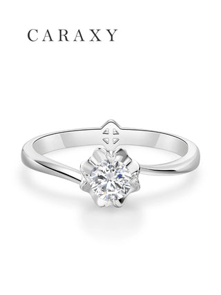 Top view of a nature-inspired floral solitaire ring with an elegant bypass band.