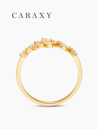 Side profile of a nature-inspired leaf open wedding band in 18K yellow gold