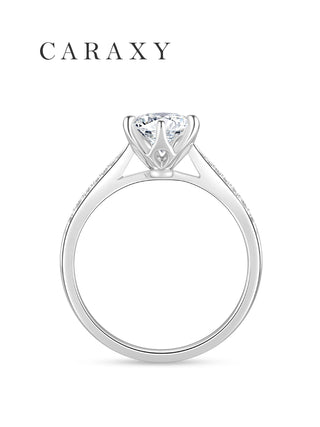 Side profile of an open gallery engagement ring showcasing the intricate six-prong head.