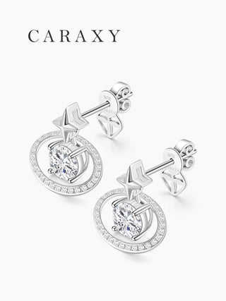 Angled view of pavé orbit diamond stud earrings with polished star details.