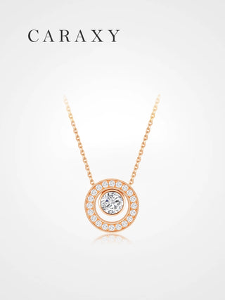 Front view of a peace buckle-inspired diamond pendant necklace in 18K rose gold with 0.75 ct tw diamonds.
