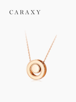 Back view of a peace buckle-inspired 18K rose gold diamond necklace showing the circular pendant design.