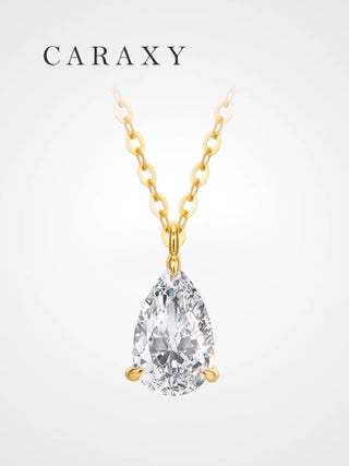 pear cut lab grown diamond solitaire necklace in 18k yellow gold on white background CARAXY