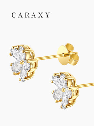 Angled view of petal diamond cluster earrings with polished posts and backs.