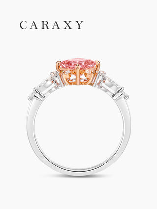 Pink diamond side stone ring side view.