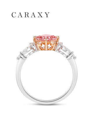 Pink diamond side stone ring side view.