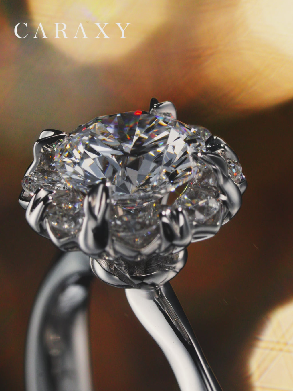 Video showcasing the floral halo engagement ring and its same set of earrings and necklace.