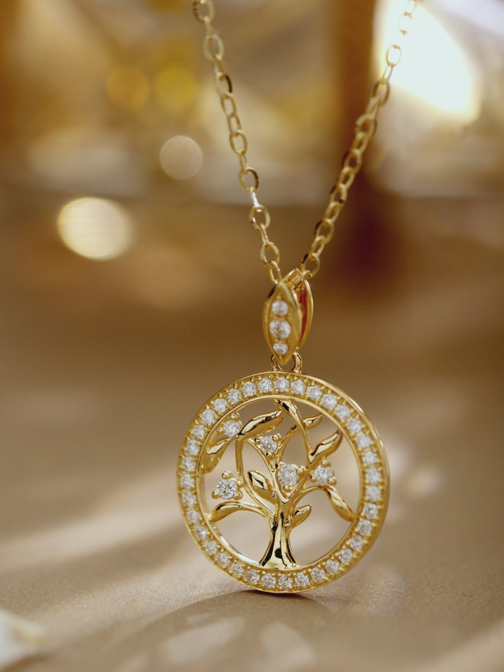Multi-angle view of the CARAXY Love Forest Tree of Life diamond necklace.