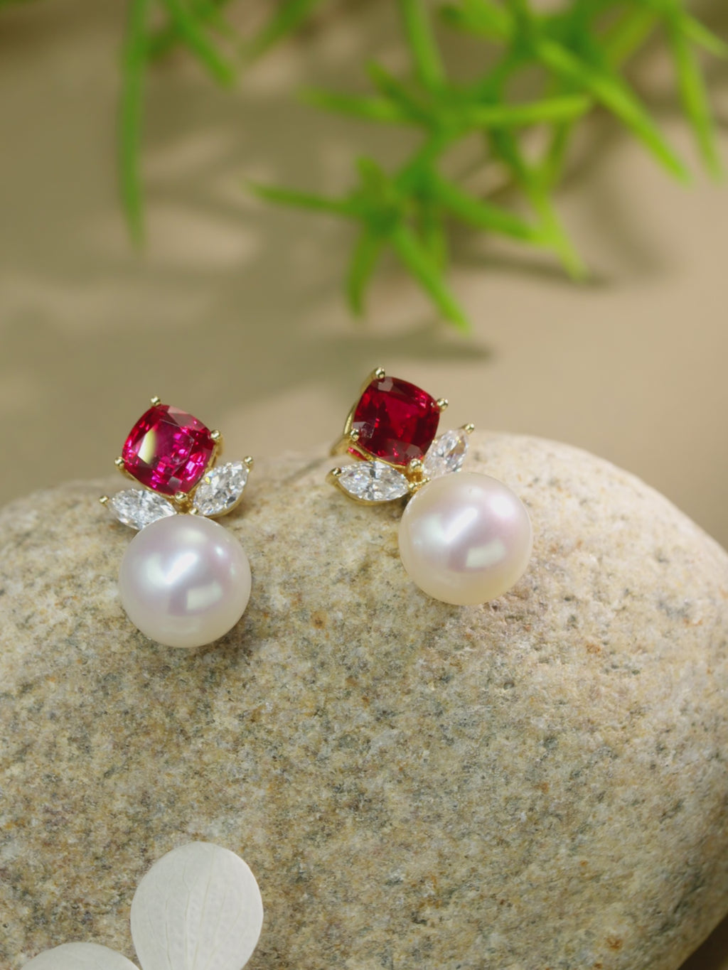 Red gemstone diamond and freshwater pearl drop earrings in 18K yellow gold shown from multiple angles