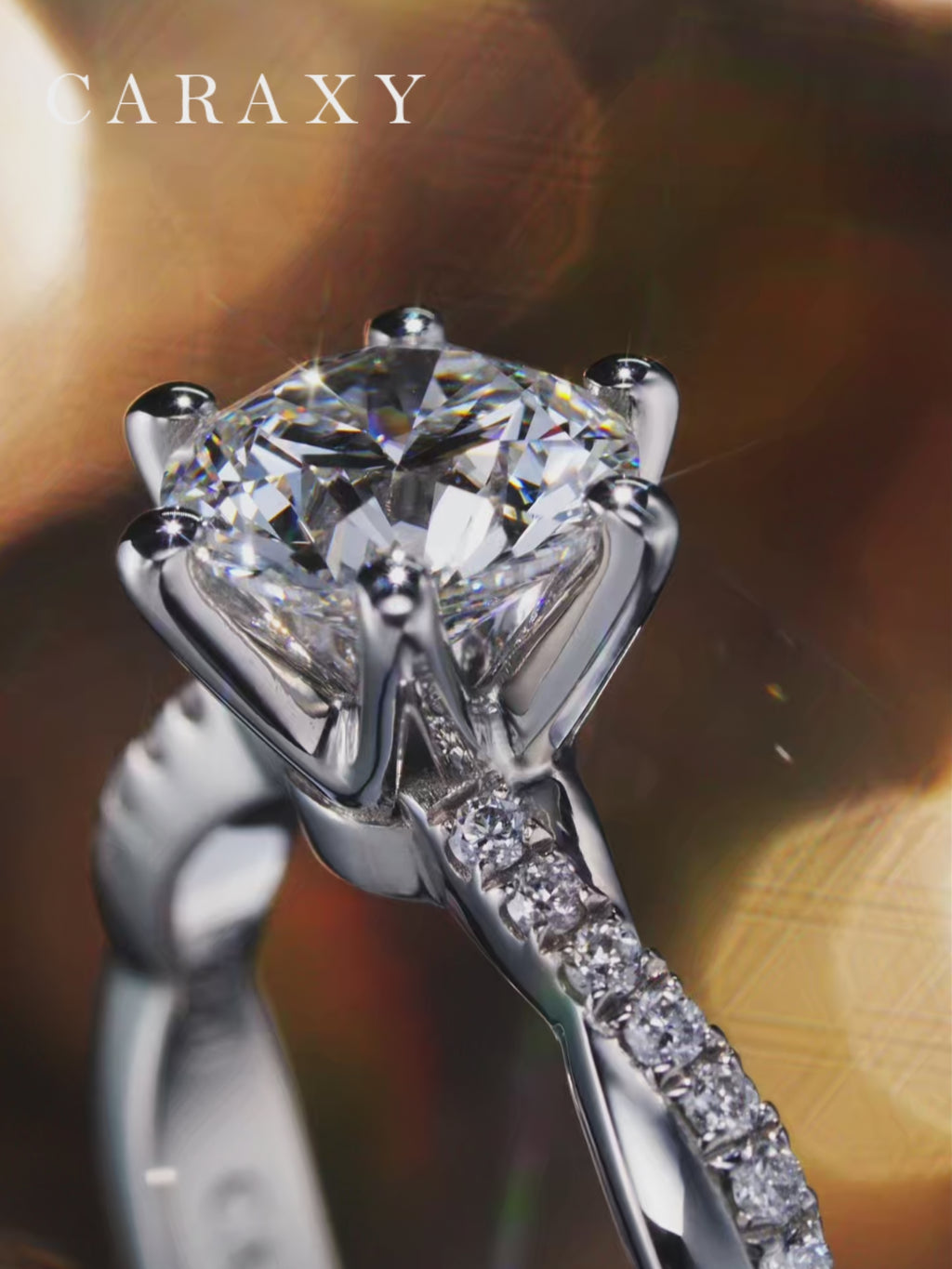 Video showcasing the sparkle of a six-prong diamond ring with a twisted pavé band.