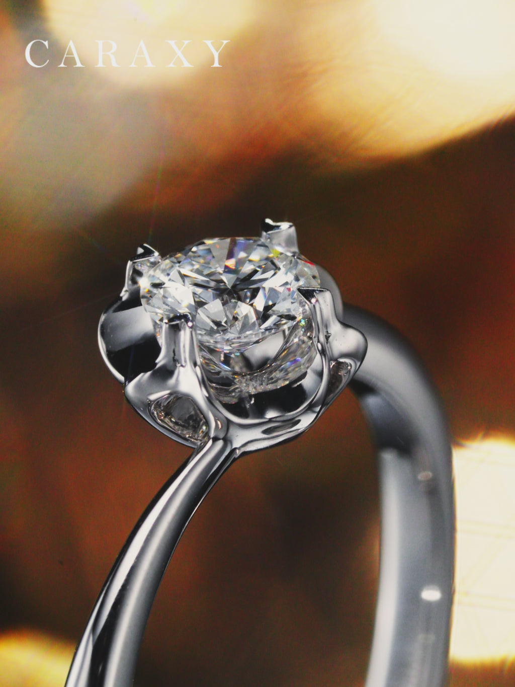 Video showcasing the romantic heart-shaped prongs and elegant bypass shank of this ring.