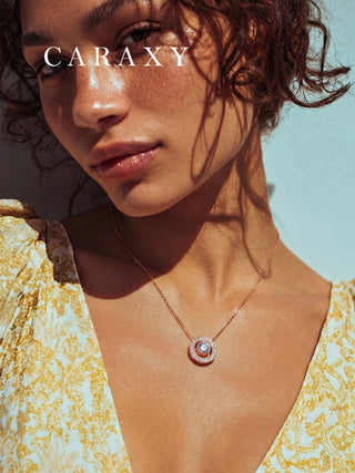 Model wearing a rose gold lab grown diamond pendant necklace inspired by the Chinese Ping An Kou.
