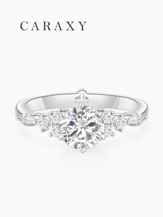 Front view of a 1 carat round diamond ring with round and marquise side diamonds