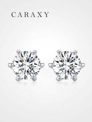 Round brilliant diamond stud earrings featuring a secure six-prong basket setting.