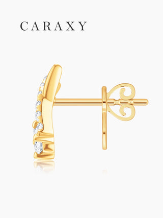 Close-up of round lab grown diamonds set along an 18K yellow gold vine design