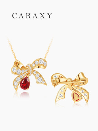 Ruby bow pendant necklace showing front design and hidden back brooch fastener for convertible styling.