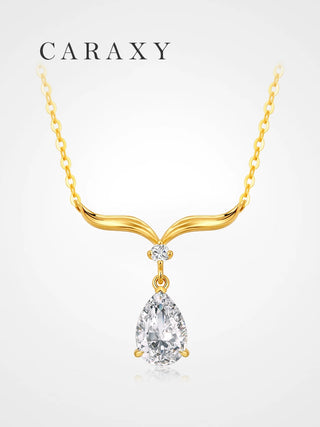 Front view of seagull-wing inspired 18K gold necklace with pear-cut lab diamond
