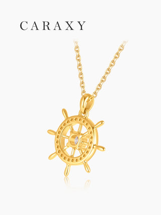 Back view of a ship wheel necklace in 18K yellow gold, featuring an openwork pendant design with a round lab-grown diamond center stone.