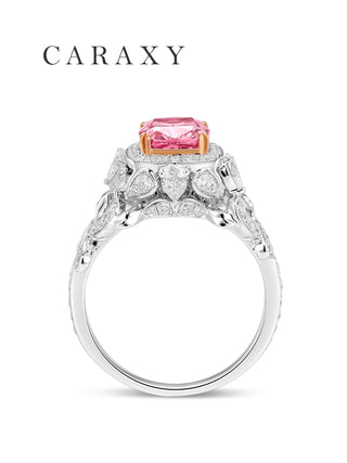 side view of pink lab grown diamond ring showcasing halo and sculpted vine detailing
