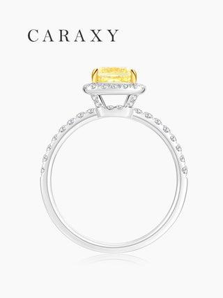 side view of cushion yellow diamond ring with halo and pave band caraxy