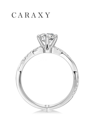 Side view of 18K white gold engagement ring with peg head.