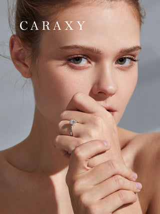 Lifestyle view of a model wearing a unique symbolic floral-inspired engagement ring.