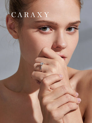 Lifestyle view of a model wearing a unique symbolic floral-inspired engagement ring.
