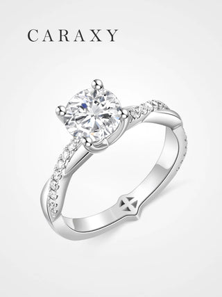 Round lab-grown diamond solitaire engagement ring with a pavé twist band in 18K white gold