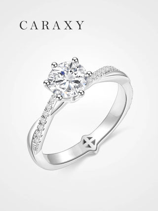 Twisted shank engagement ring featuring a round lab-grown diamond in a six-prong setting.