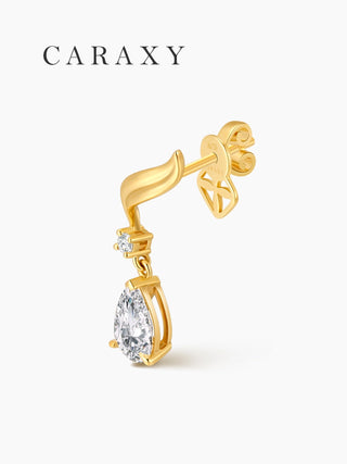 Side profile of unique diamond drop earrings with a pear-shaped center stone.