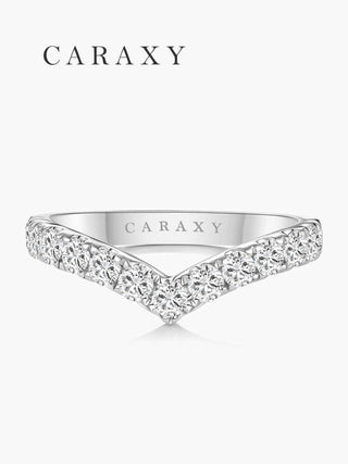 Front view of a V-shaped curved diamond wedding band with a half eternity design
